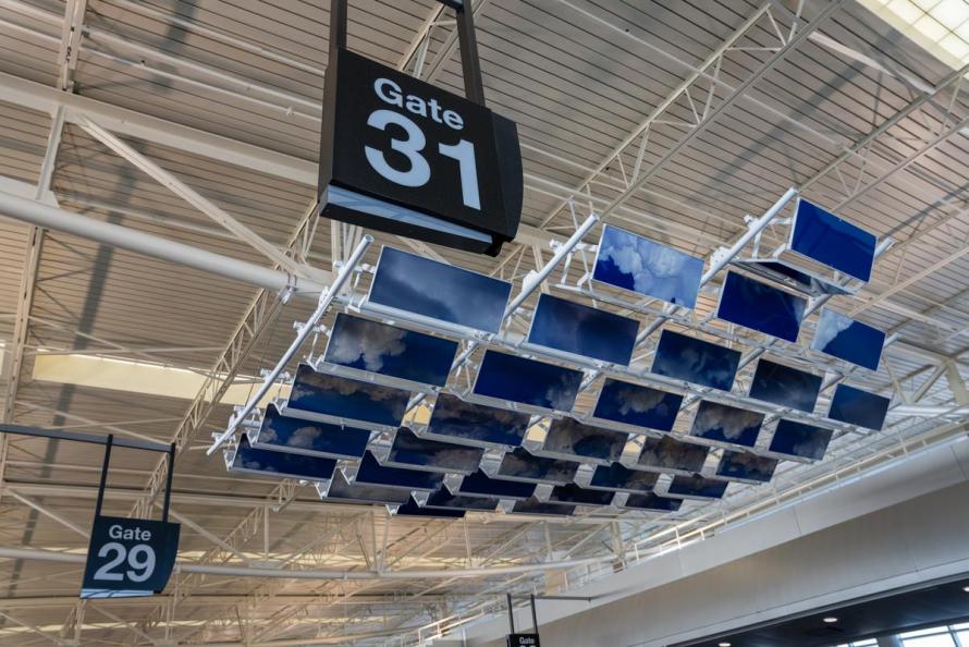 HOU West Central Concourse – 4 suspended cast resin panels by R&R&R 